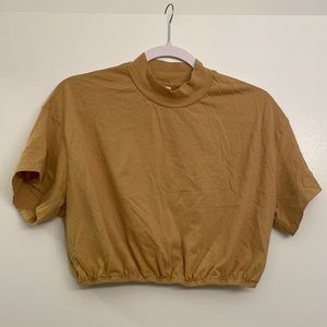 ALO Crop Top in Mustard color